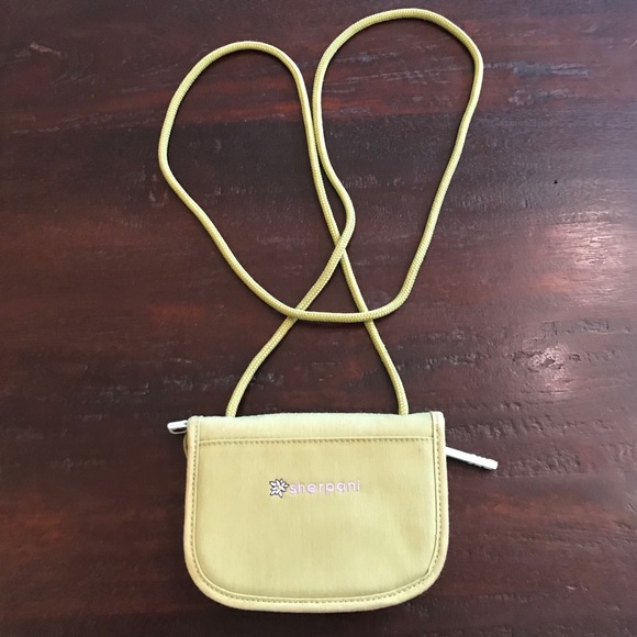 Handbags - NWOT Sherpani Green Crossbody Bag